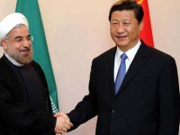File photo of Iranian President Hassan Rouhani and Chinese President Xi Jinping.