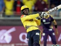 Darren Sammy of Peshawar Zalmi hitting a shot during a PSL match.