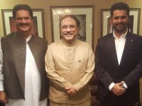 Nabil Gabol, left, is standing with former president Asif Ali Zardari, center.