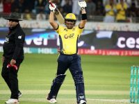 Kamran Khan celebrating his century.