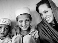 JALALABAD, AFGHANISTAN - OCTOBER 22: UNHCR (United Nation High Commissioner for Refugee) Good Will Ambassador Angelina Jolie is seen during her visit to Afghan returnees from the recently closed Jallozai camp in Lower Skeikh Mesri in Jalalabad on October 22, 2008 during her three days visit to Afghanistan. (Photo by Marco Di Lauro/Getty Images)